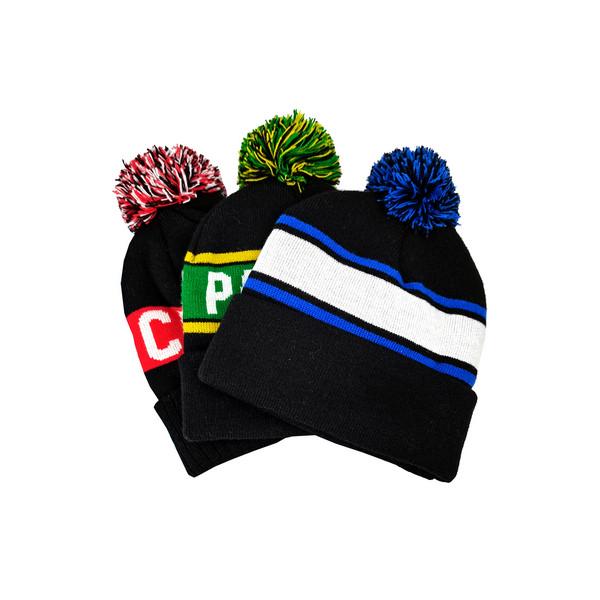 Toque with pompoms